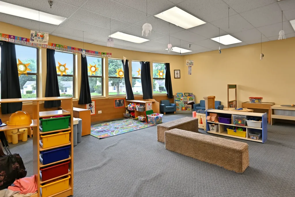 Toddler classroom with cubbies and play areas in Island Lake