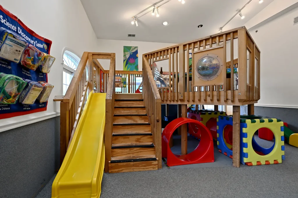 Indoor gym with play structure and slide