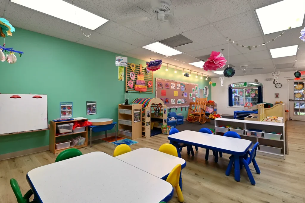 Twos classroom with art displays and learning centers