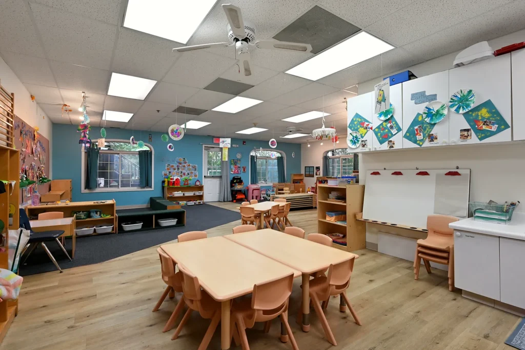 Twos classroom tables and reading corner in Lake Zurich